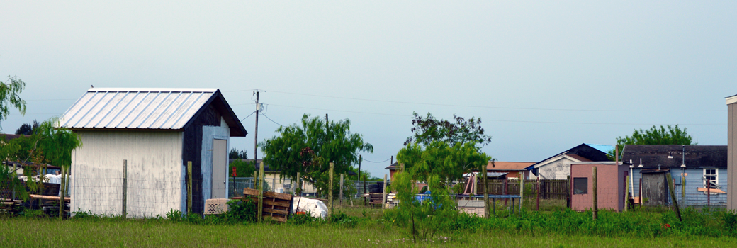 A hero image of a Texas border neighborhood, also known as a colonia
