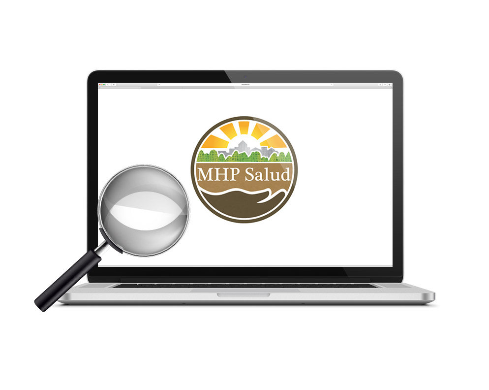A laptop with MHP Salud's logo and magnifying glass.