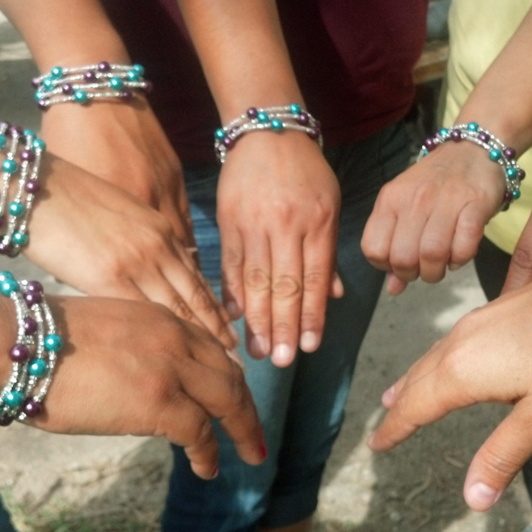 Women's Hands With Bracelets