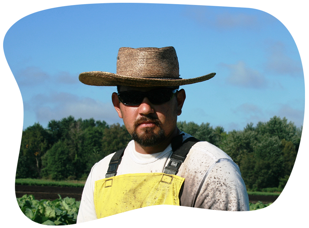 Farmworker with Hat and Shades in Field