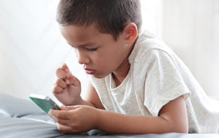 Child with Smart Phone