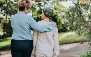 Patient advocate walking with a patient